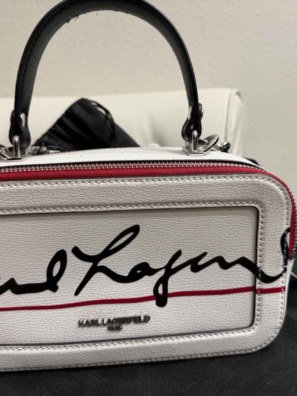 Karl Lagerfeld White Mini Top-Handle Bag with Red Trim and Black Script